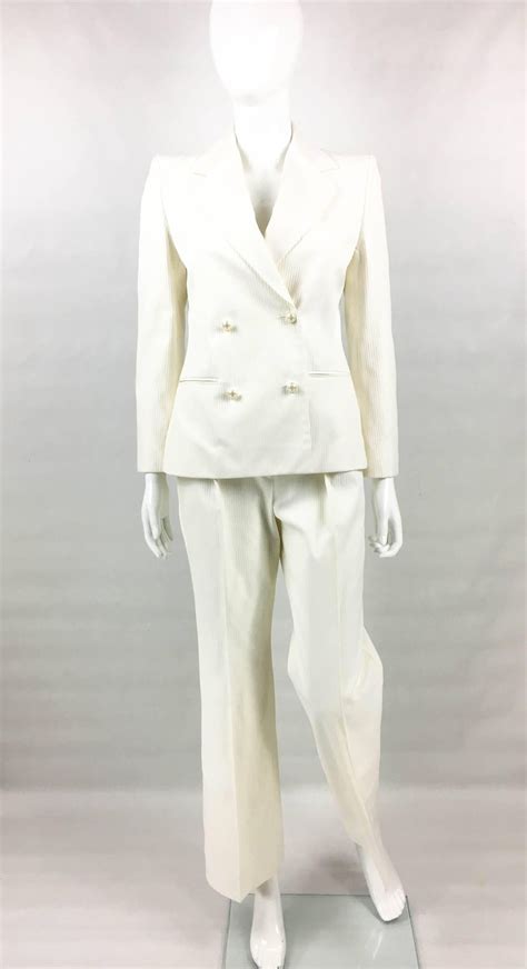 chanel white pantsuit|Chanel denim pants.